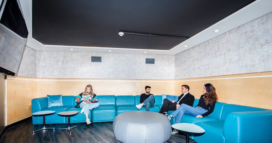 Social space with large tv and a sofa accommodating four students at Urbanest Tower Bridge in London