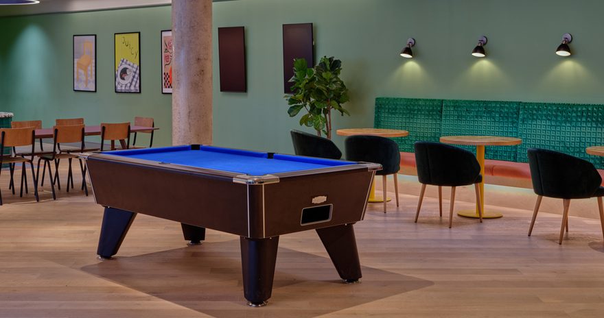 Social space at Scape Canada Water with a pool table table