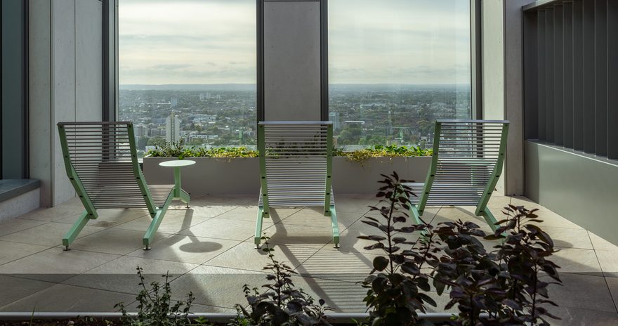 Social spaces with chairs and views over the city