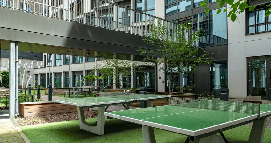 Courtyard play area where residents can play table tennis