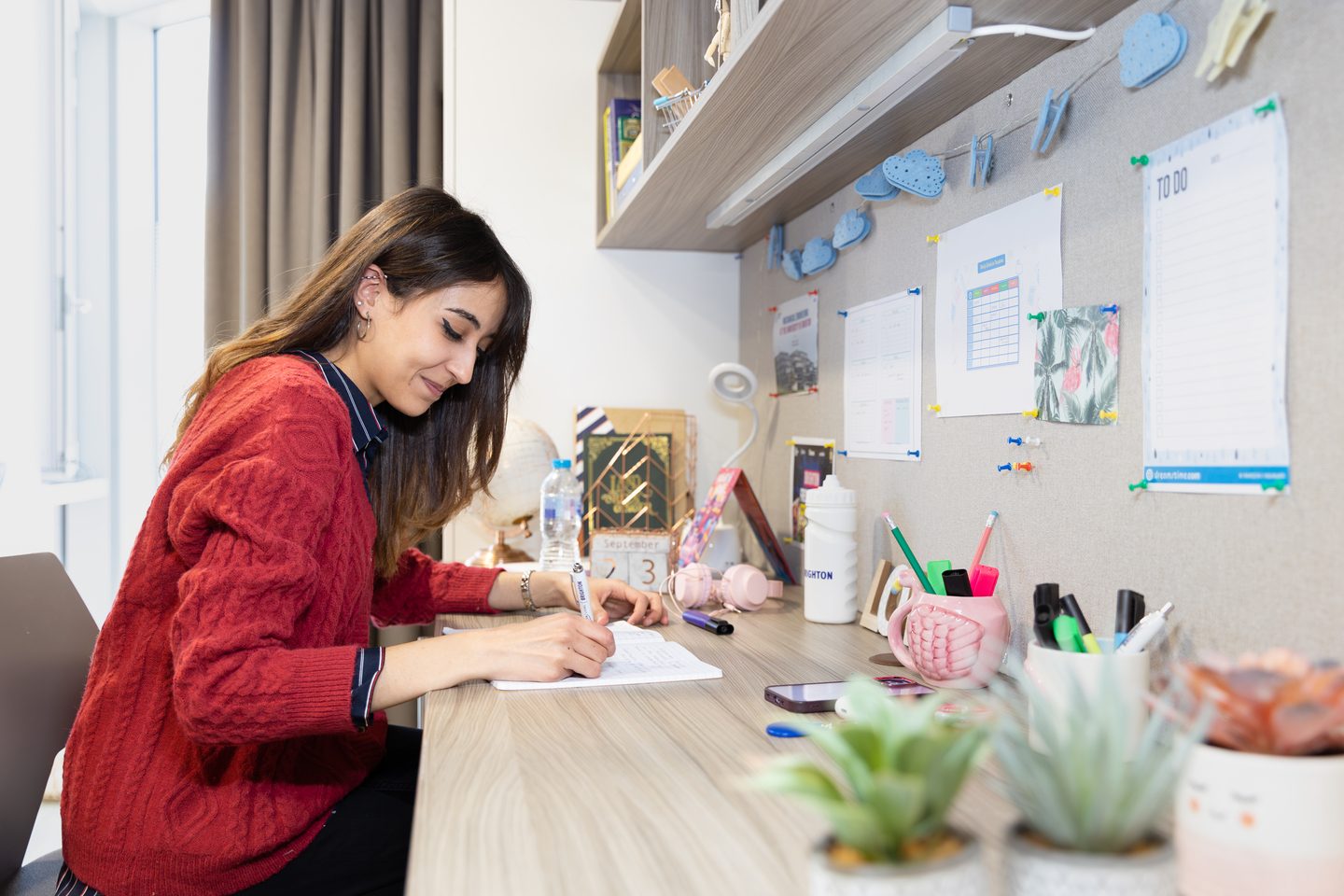 A student living and studying in accommodation